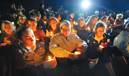 Local High School students Madelyn Fainga'a, Meghan Chavis and Danielle Eocchia sat quietly as officials spoke about Bella Bond.